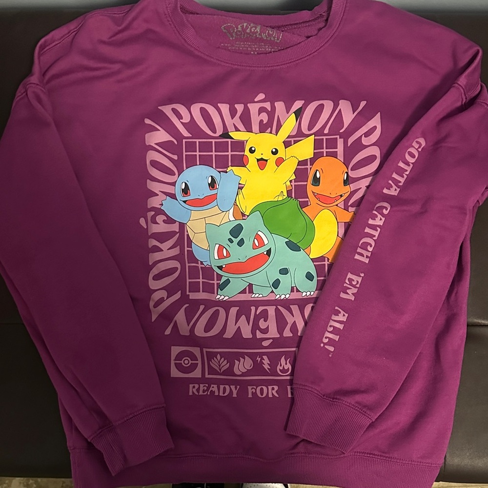 Women’s- may be juniors size M Pokémon sweater